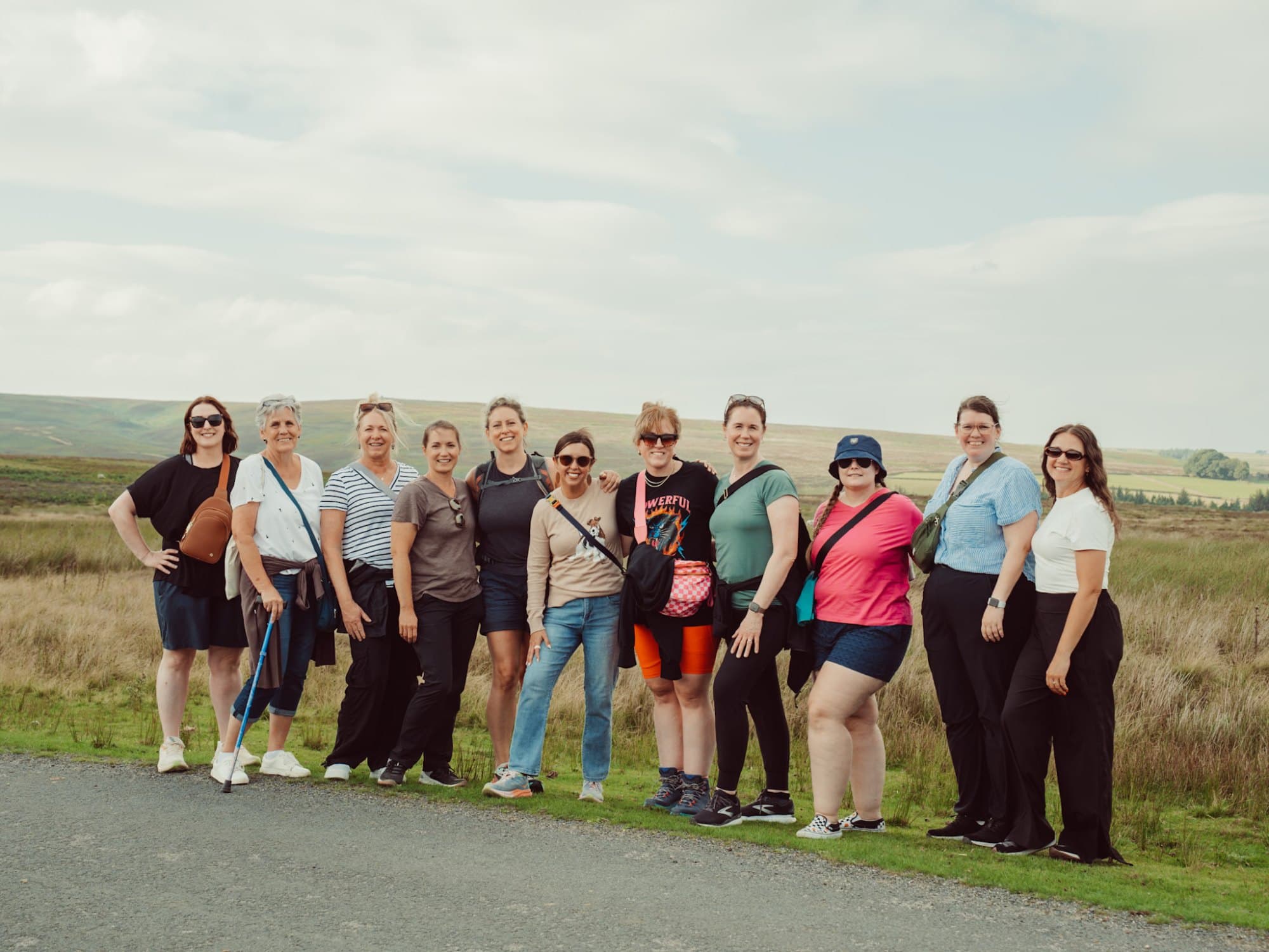 a group of women hiking on the yorkshire moores