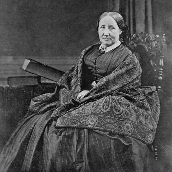 a black and white photograph of Elizabeth Gaskell