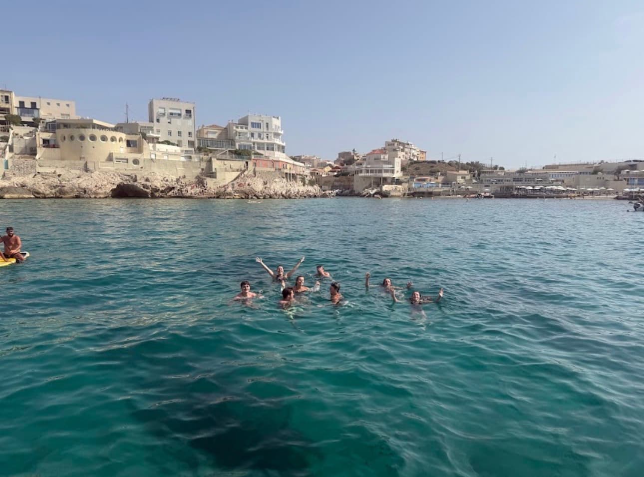 Swimming from sailboat, French Book Club Tour